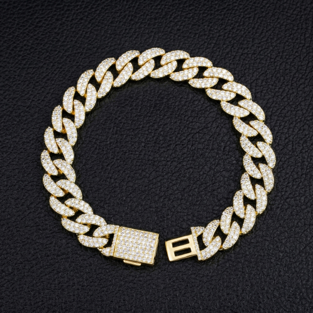 Flat lay top view of a 13mm VVS moissanite Cuban link bracelet in S925 silver with a secure box clasp, fully iced out with D-E color round stones.