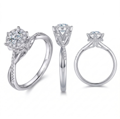 Three comprehensive angles of an 18K gold engagement ring featuring a 0.6 carat round lab-grown diamond, a radiant halo, and a twisted pave shank.