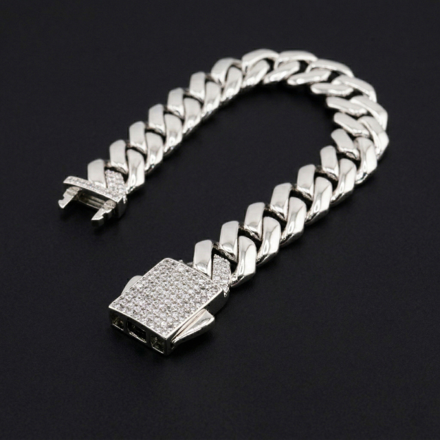 U-shaped flat lay display of a 10mm sterling silver moissanite bracelet crafted by an 18-year jewelry factory, showing impeccable setting craftsmanship.