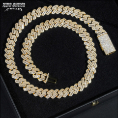 High-contrast presentation of the 15mm iced out moissanite hip hop chain against a dark background, highlighting the intense brilliance and icy white D-E color of the gemstones.