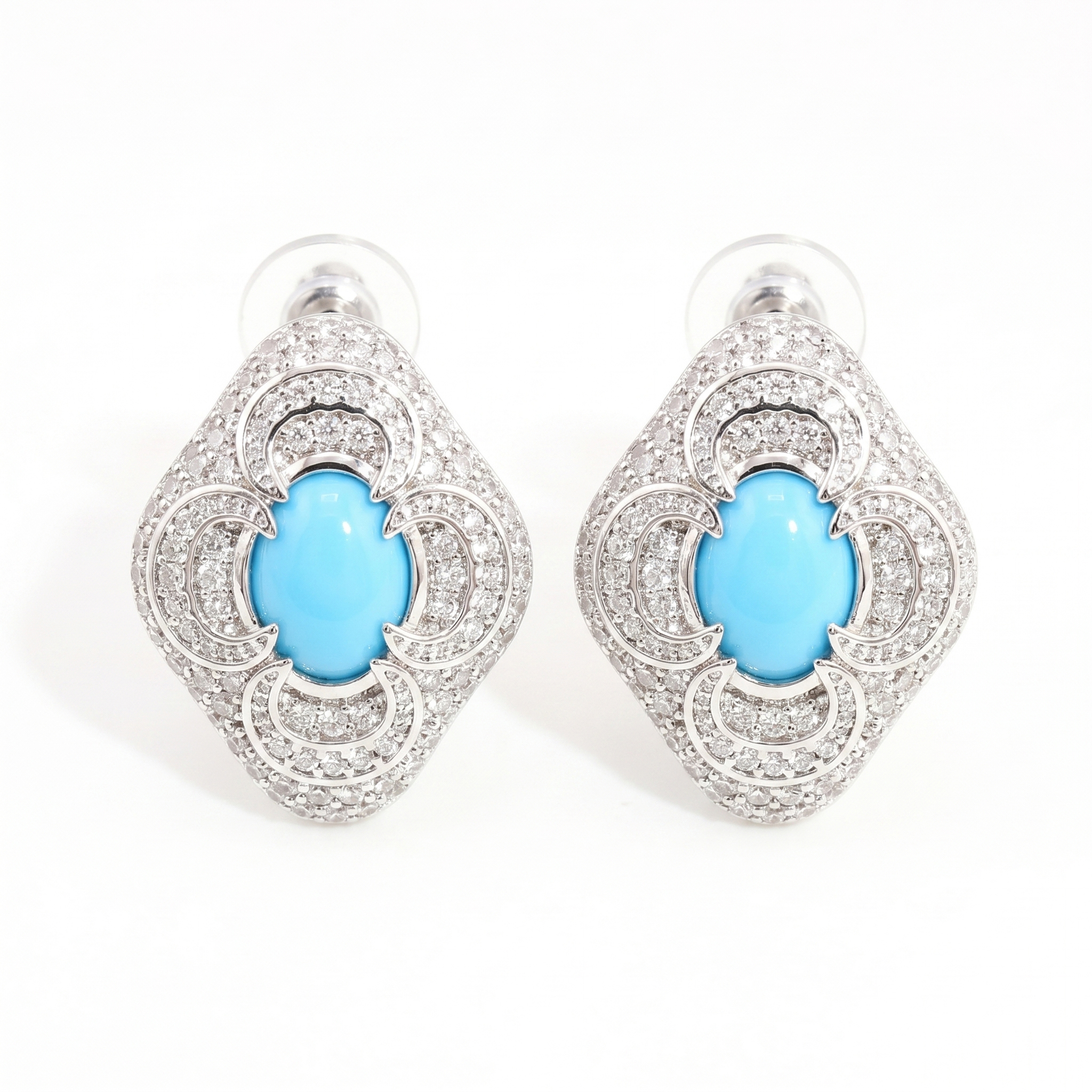 Flat lay pair view of the handmade S925 sterling silver moissanite earrings with secure backings.