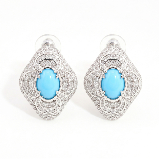 Flat lay pair view of the handmade S925 sterling silver moissanite earrings with secure backings.