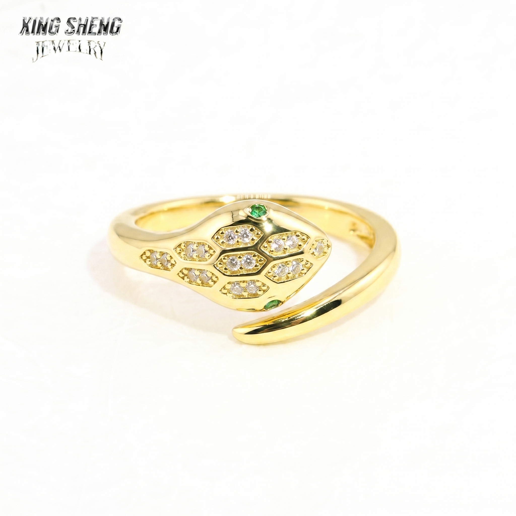 Gold aesthetic S925 sterling silver snake ring featuring a thick rhodium plating, a round brilliant 6A VVS moissanite center stone, and intricate micro-pave serpent scale detailing.