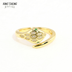 Gold aesthetic S925 sterling silver snake ring featuring a thick rhodium plating, a round brilliant 6A VVS moissanite center stone, and intricate micro-pave serpent scale detailing.