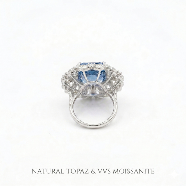 Bottom view of the solid gold ring band and setting structure, featuring the text "NATURAL TOPAZ & VVS MOISSANITE" to guarantee gemstone authenticity and premium quality.