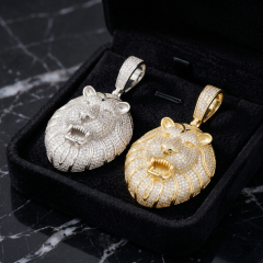 Side profile highlighting the 3D realistic iced out lion face pendant showing thick silver setting inside black velvet box.