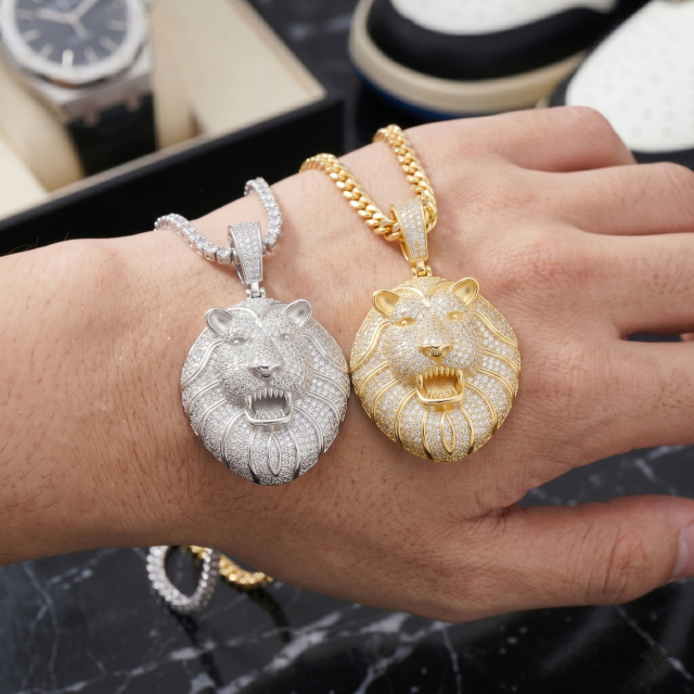 Hand modeling size reference of 18K yellow gold and white gold 925 silver moissanite lion chain pendants.
