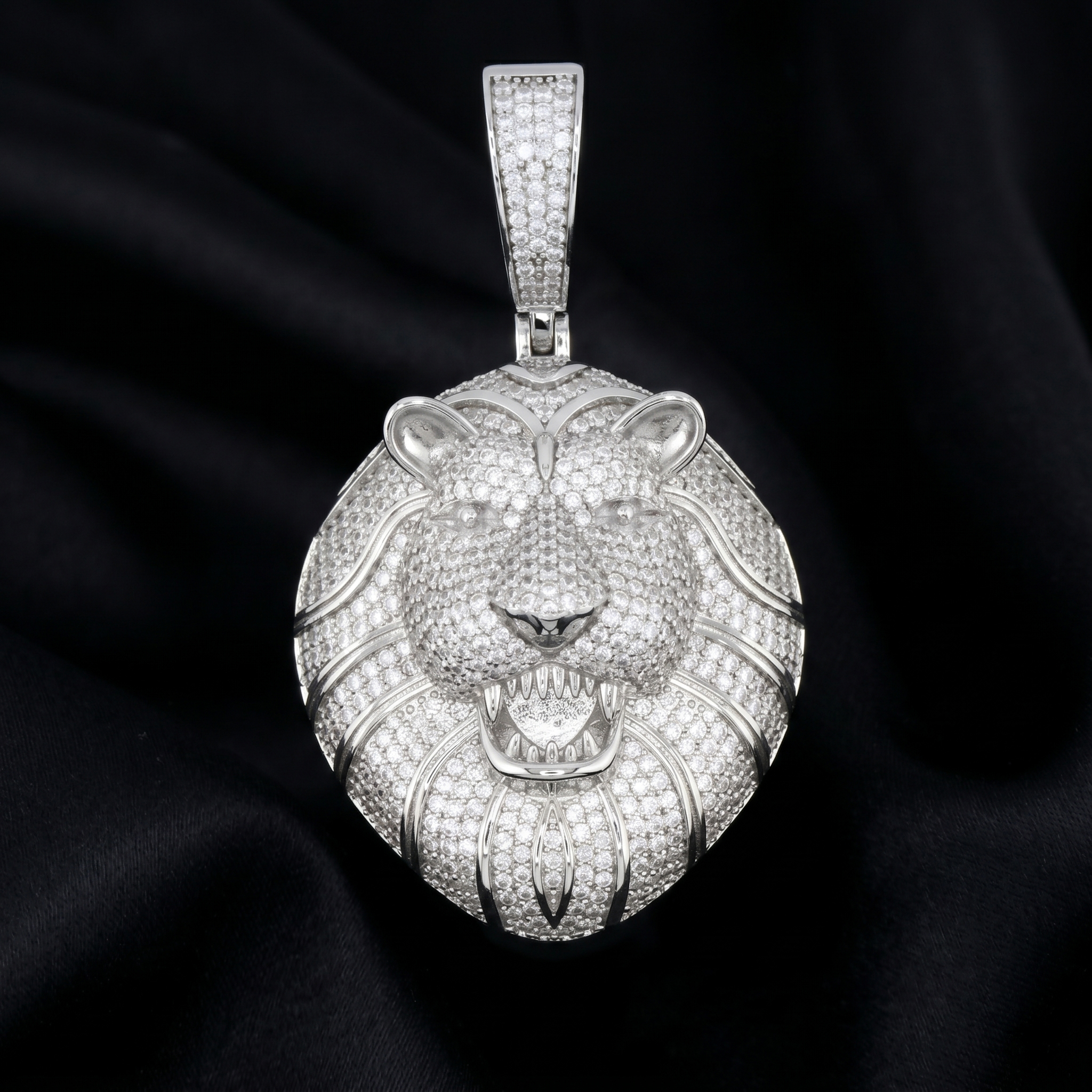 Macro close up of 18K white gold rhodium plated VVS moissanite lion head hip hop jewelry for men.