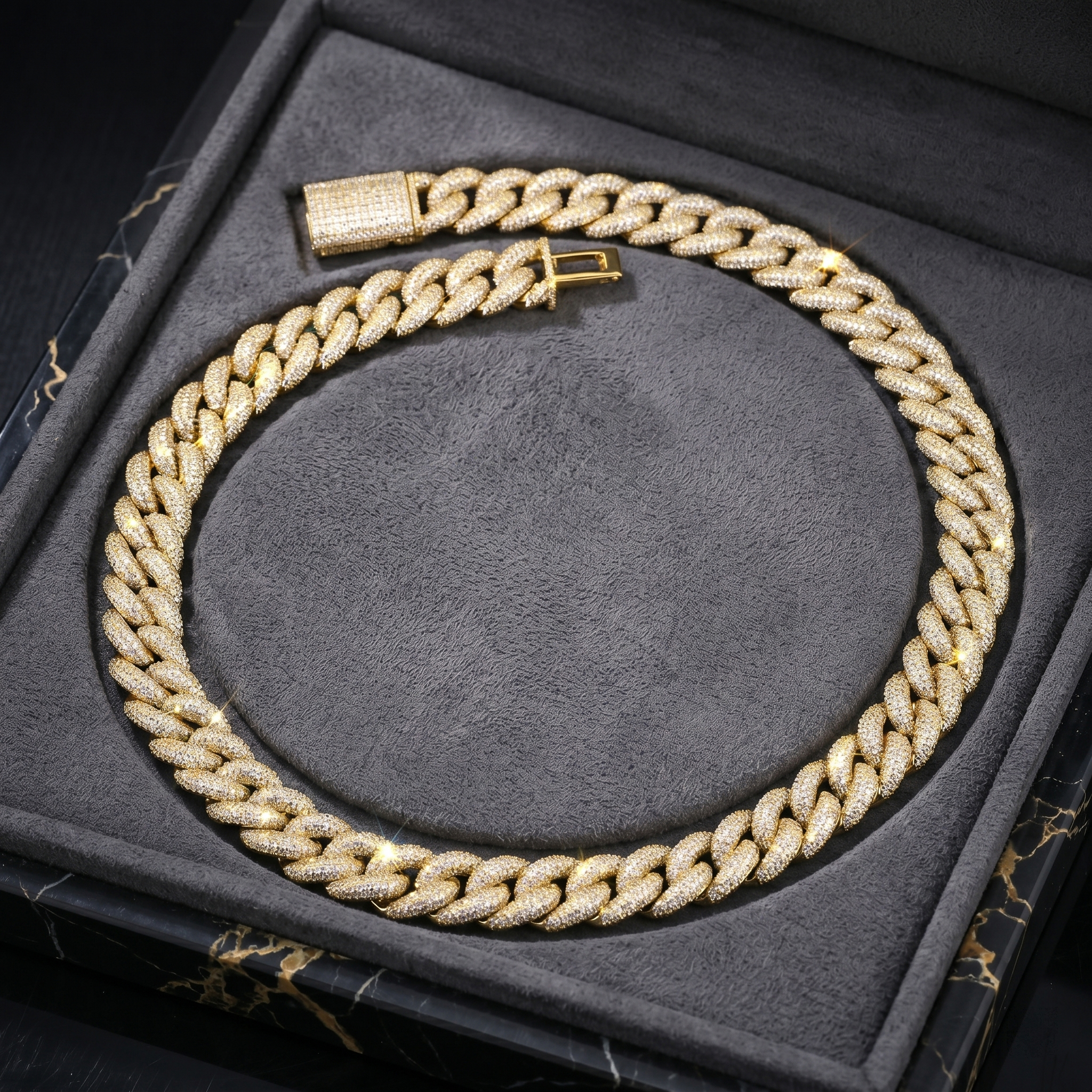 The heavy 16mm iced out moissanite Cuban chain in a stunning yellow gold finish, beautifully presented inside a dark luxury jewelry box, highlighting its high-end gift appeal.