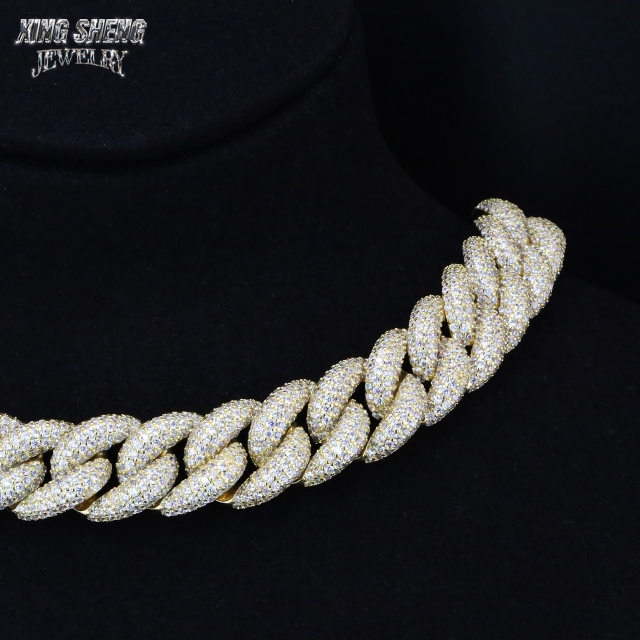 Macro view of a 16mm gold-plated S925 silver Cuban link chain showcasing micro-pave VVS moissanite stones.