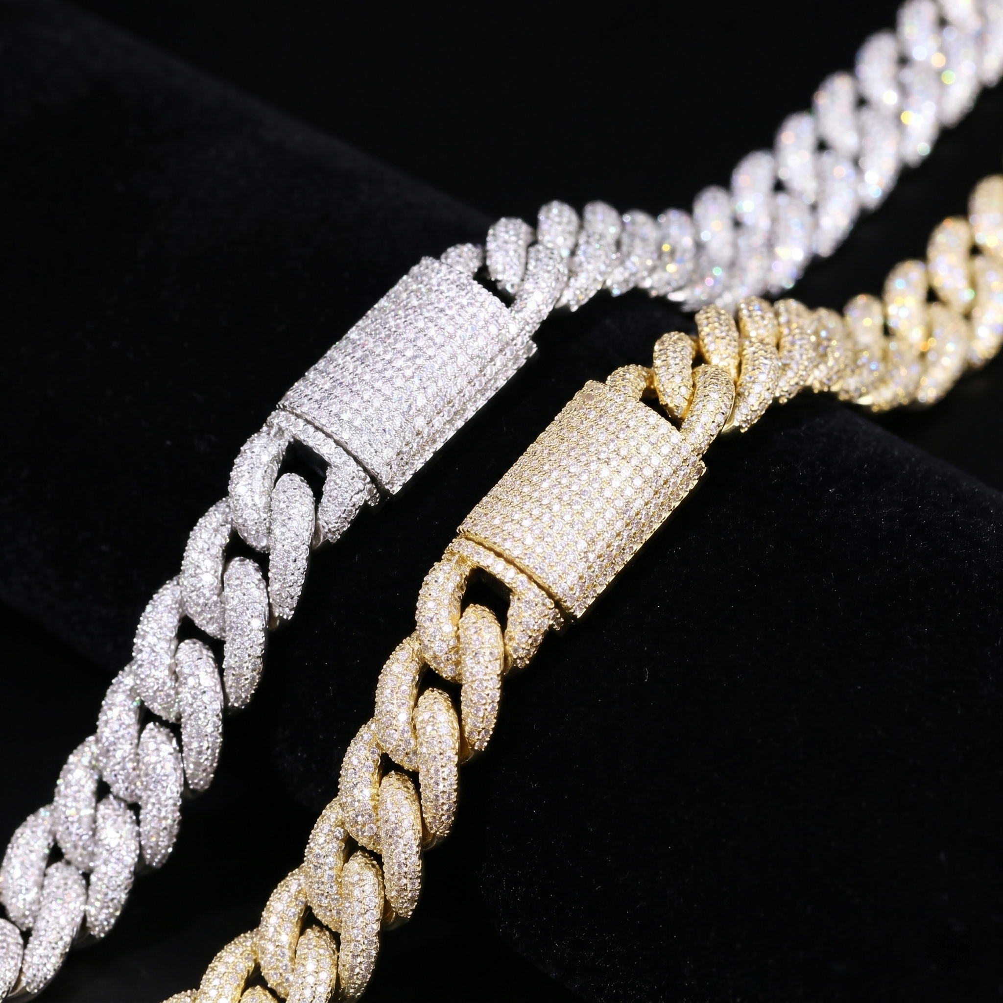 Side-by-side comparison of secure iced-out box clasps on 16mm moissanite Cuban link chains in silver and gold.