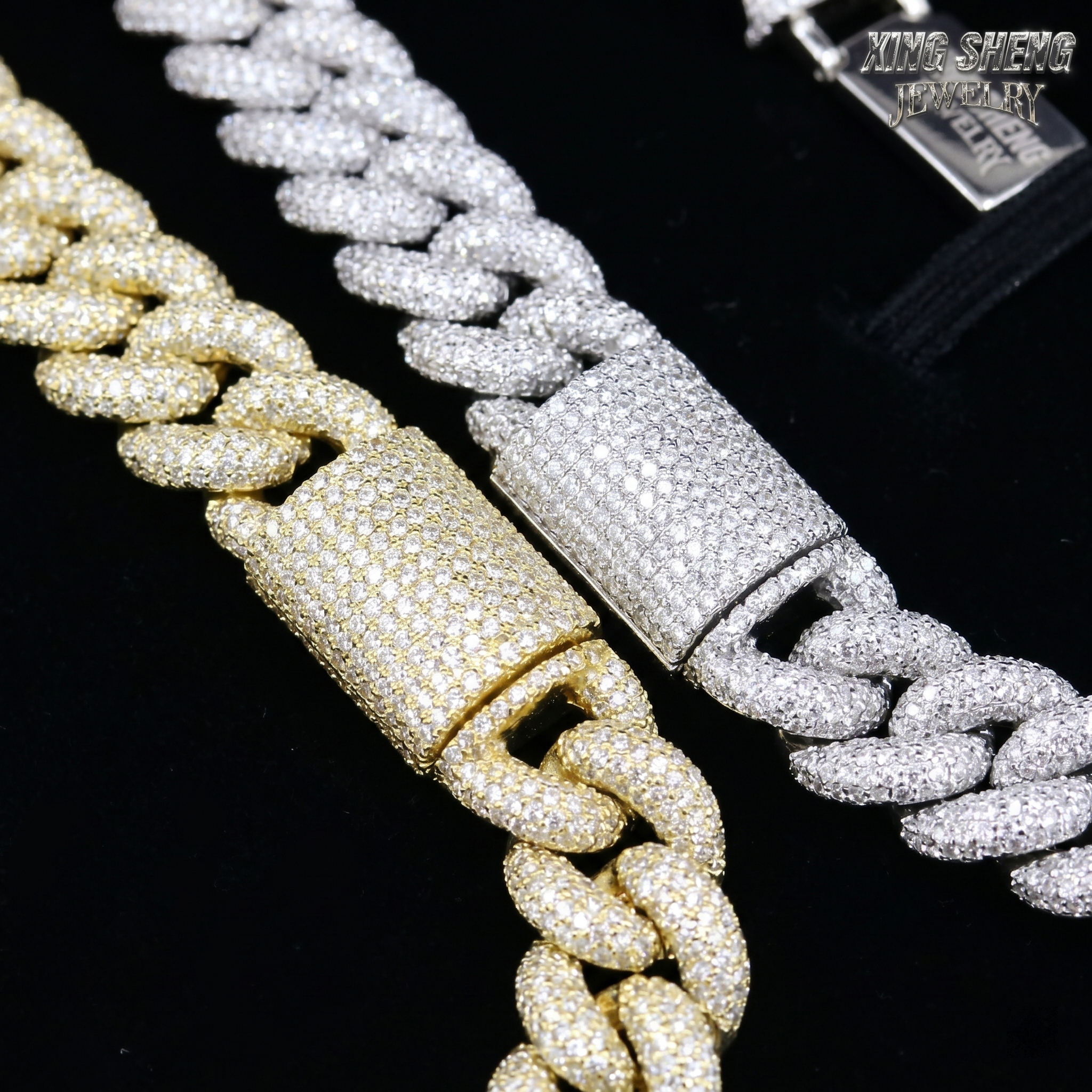 A side-by-side macro comparison of the 16mm moissanite Cuban link chains in glowing yellow gold and pure white gold (rhodium over S925 silver), revealing the impeccable prong-setting craftsmanship free of any glue.