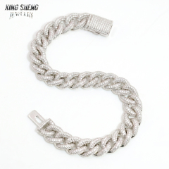 10MM iced out VVS moissanite Miami Cuban link bracelet laid in an S-shape on a white background