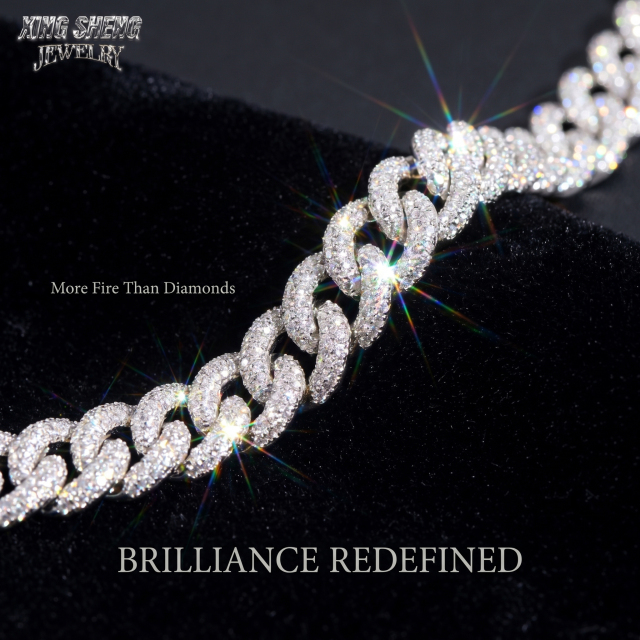 Macro photography of the 10MM 3-row moissanite Cuban necklace resting on black velvet, displaying more fire and light dispersion than natural diamonds.