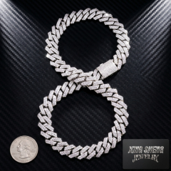 Heavy 13MM iced out moissanite Cuban chain arranged in a figure-eight shape next to a US quarter coin, demonstrating the massive width and solid build.