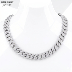 Display mannequin showing how the thick 13MM moissanite Cuban link chain rests perfectly on the neckline, demonstrating the drape of the S925 silver links.