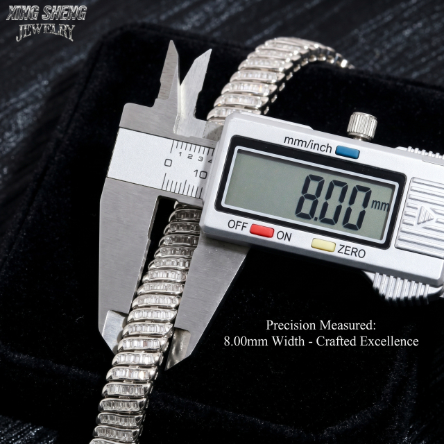 A digital caliper tool precisely measuring the width of the moissanite tennis bracelet, confirming its exact 8.00mm substantial architectural dimensions.