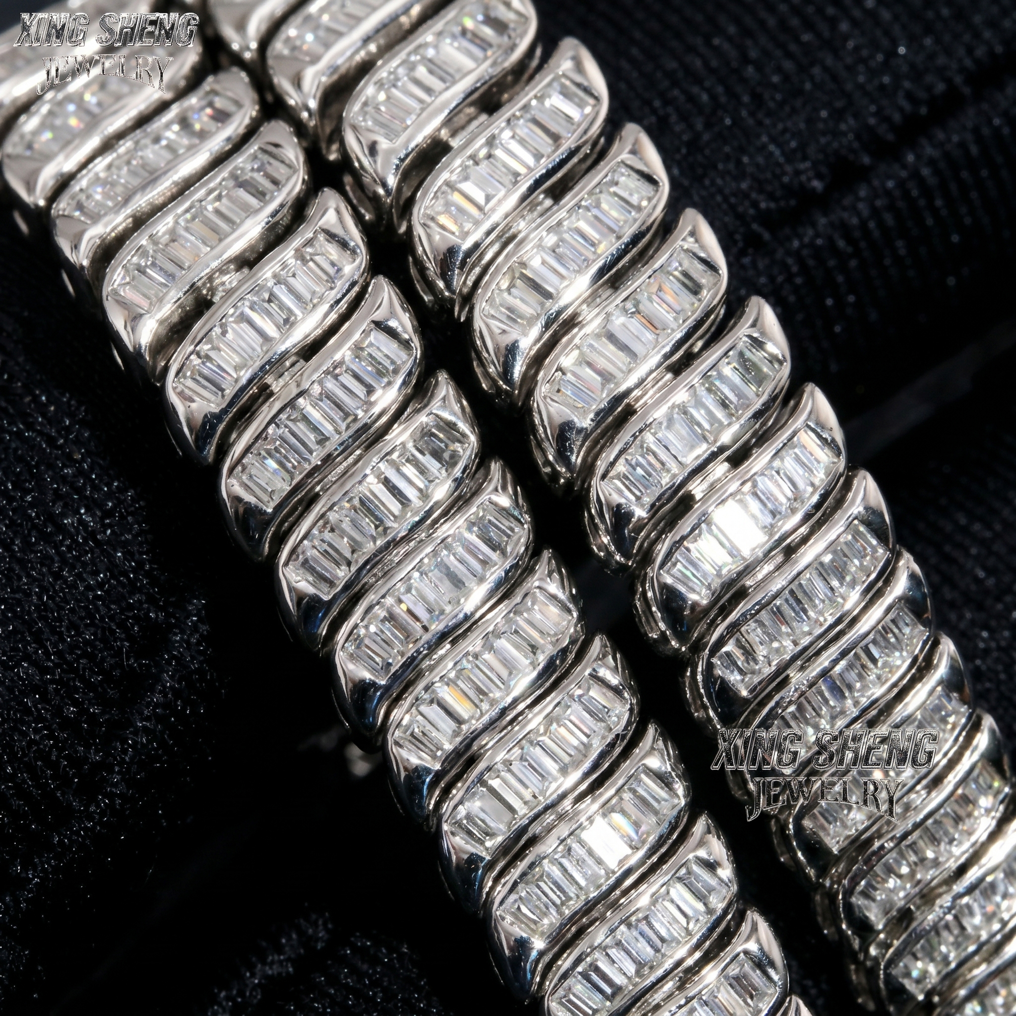 Two 8mm baguette moissanite bracelets stacked tightly side-by-side on black velvet, highlighting the precise geometry and seamless step-cut faceting.