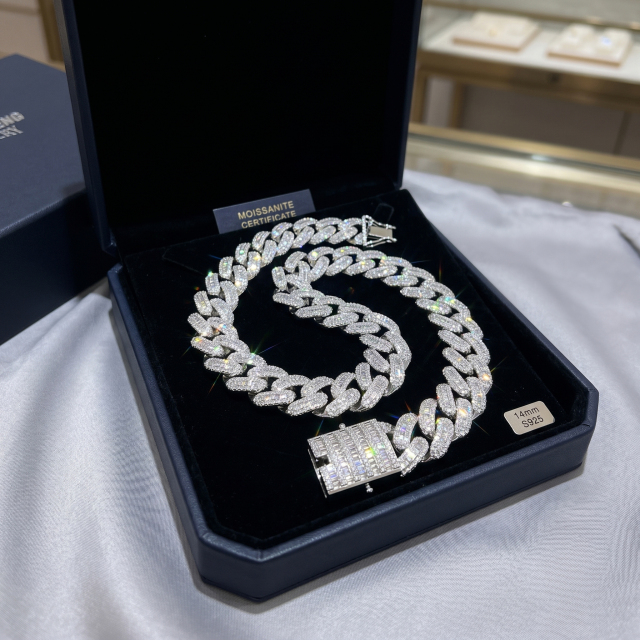 A 16-inch 14mm baguette cut moissanite Cuban choker necklace beautifully presented inside a luxury custom jewelry box with its accompanying Moissanite certificate, highlighting its intense light dispersion.