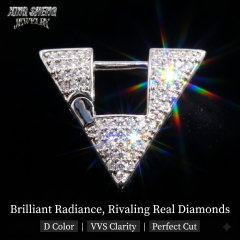 Dramatic lighting photography highlighting the exceptional rainbow dispersion, high refractive index, and spectacular fire of the 6A grade, round-cut moissanite stones against a black background.