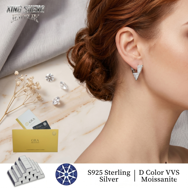 Female model wearing 10mm moissanite geometric huggie earrings, demonstrating the comfortable, sleek profile and everyday wear minimalist aesthetic on the earlobe.