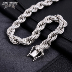High-resolution focus on the integrated locking mechanism and flawless 6A grade moissanite stones on the silver rope chain.