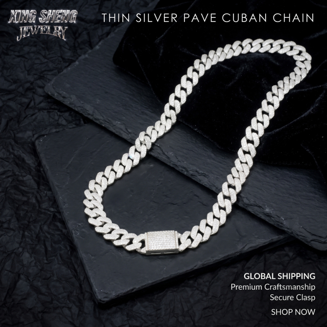 Display of the secure heavy-duty fold-over box clasp on the thin silver pave Moissanite Cuban chain.