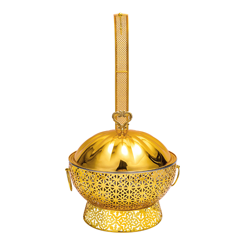 Gold chafing dish with chaotic pattern