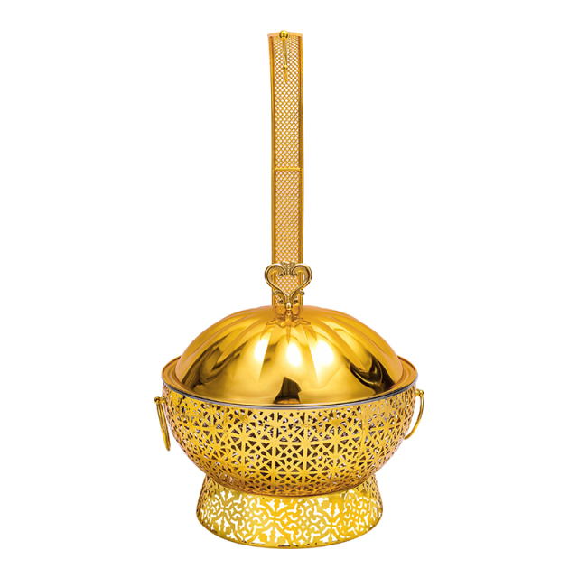Gold chafing dish with chaotic pattern