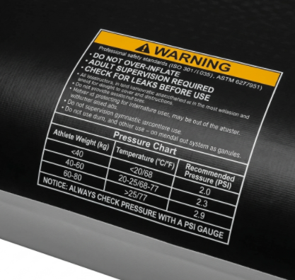 Safety and maintenance guidelines printed on a commercial inflatable wrestling mat