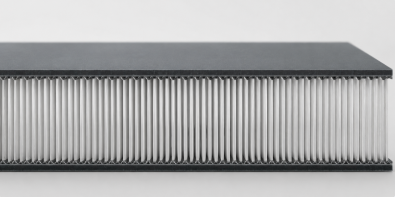 A 3D cross-section render of a TPU drop stitch panel showing thousands of vertical internal threads pulled taut between two flat outer layers.