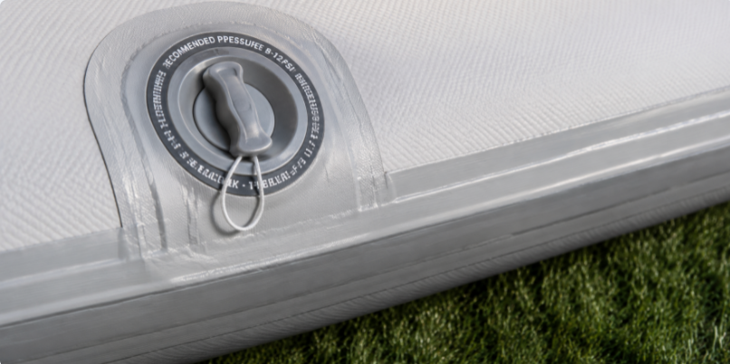 Reinforced valve and seam on a drop-stitch pool showing stress points