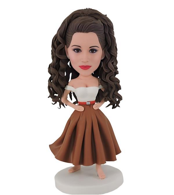 Customized bobblehead dolls wearing skirts