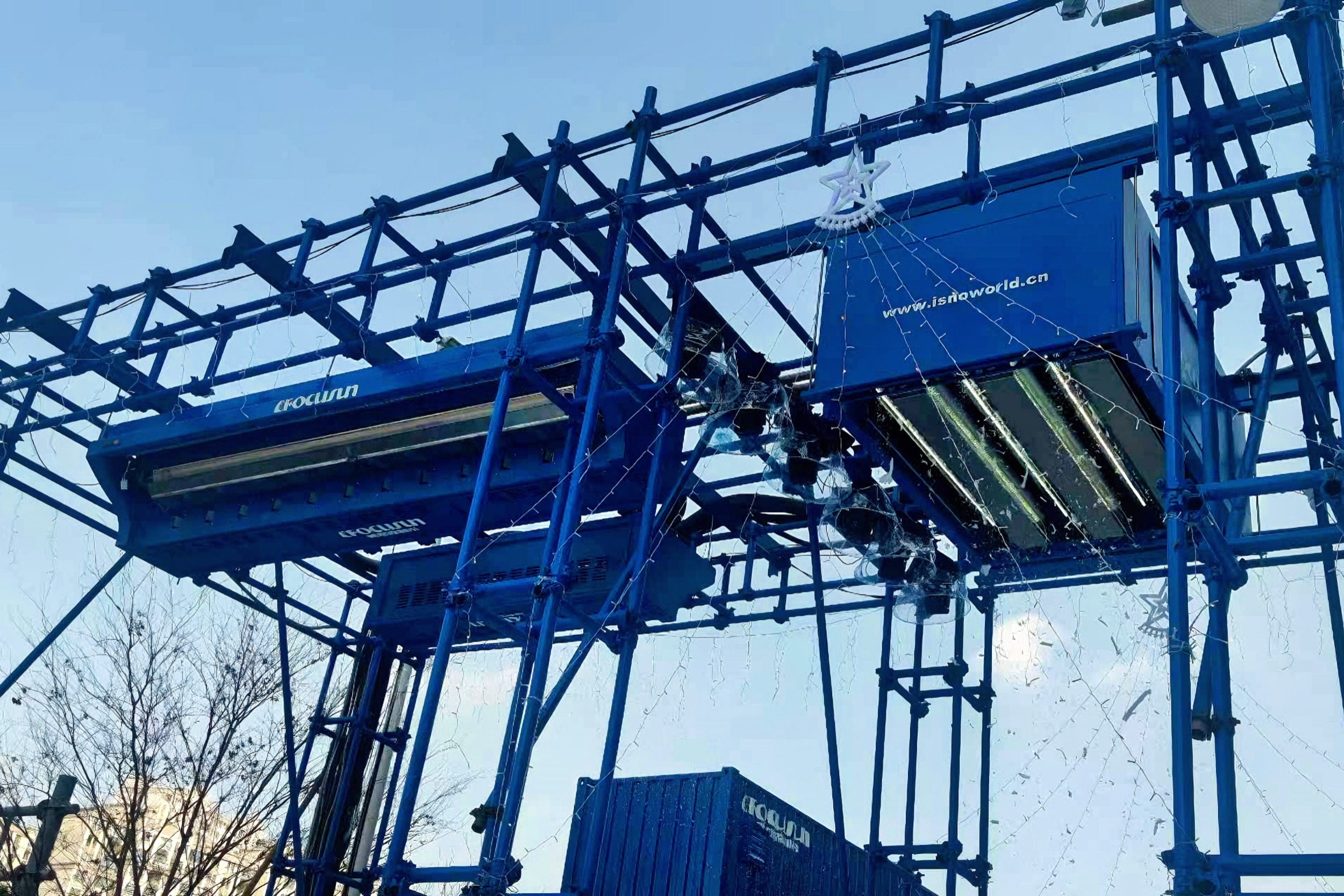 Outdoor Focusun snow falling machine suspended above venue creating continuous snow effect