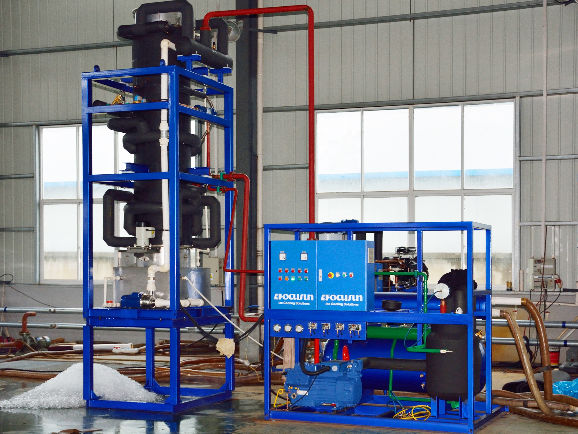 Industrial tube ice machine producing cylindrical ice for beverage cooling and food processing applications