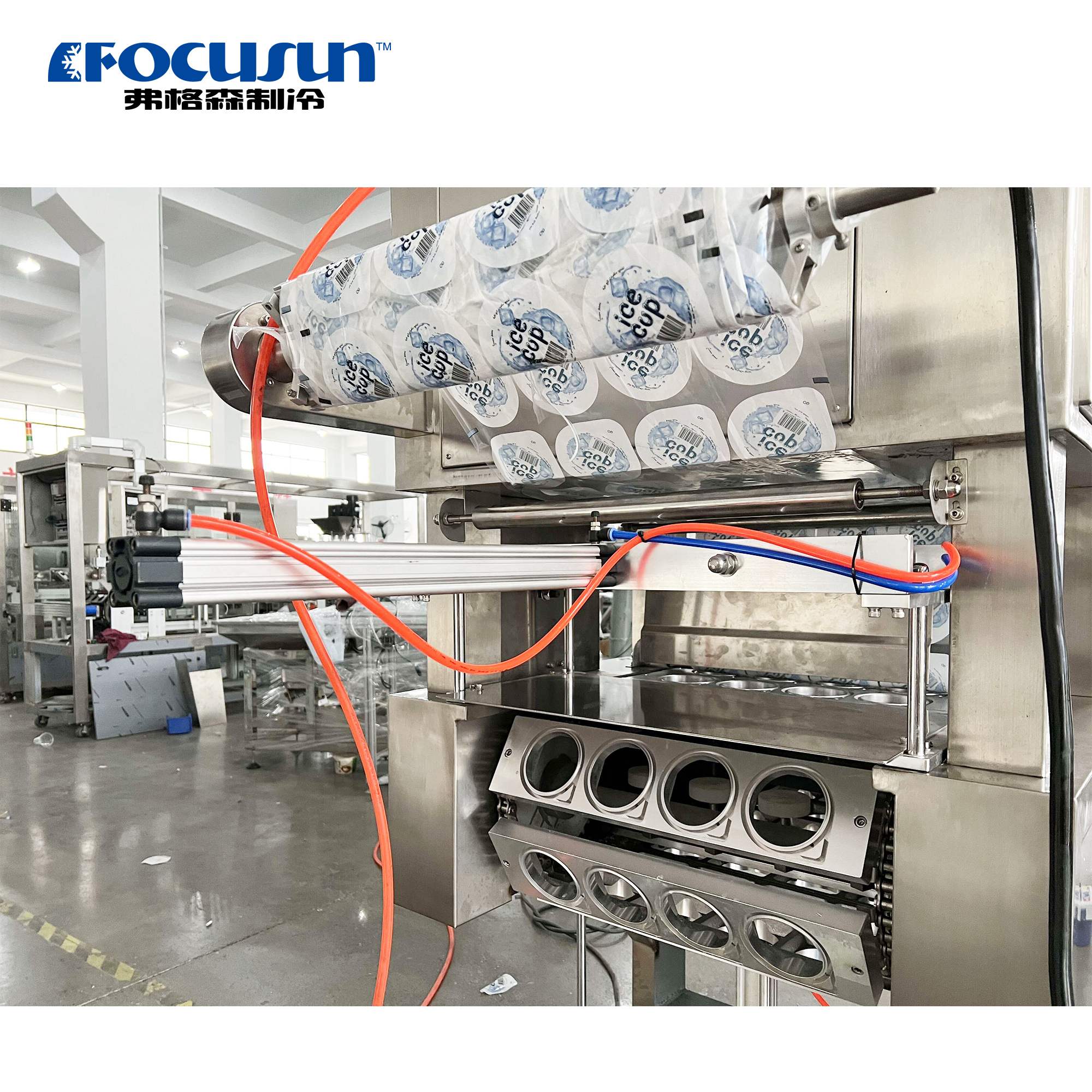 Automated heat sealing station of an ice cup machine ensuring hygienic and leak-proof packaging.