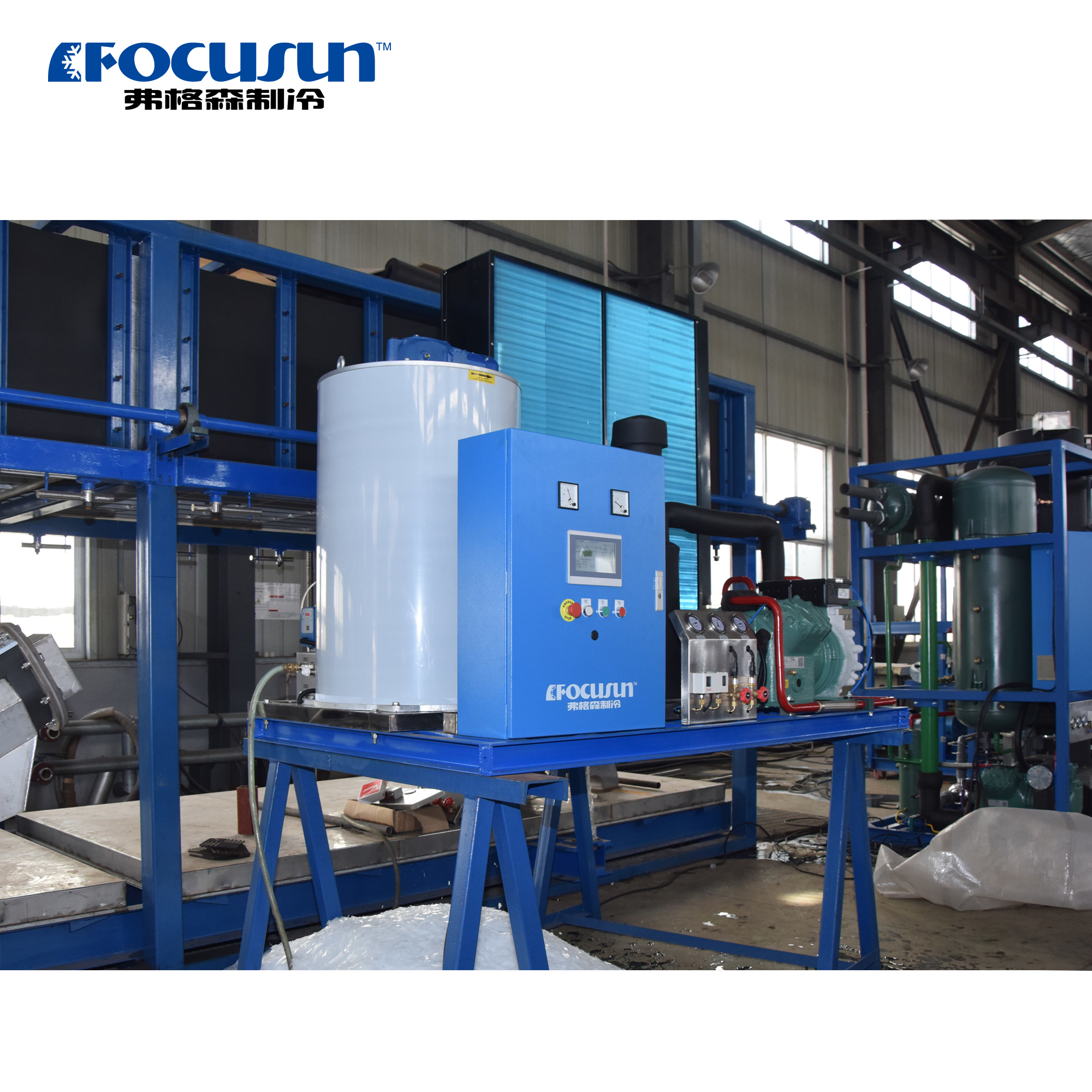 Continuous-output flake ice machine producing soft, thin ice flakes for rapid product chilling and supermarket displays.