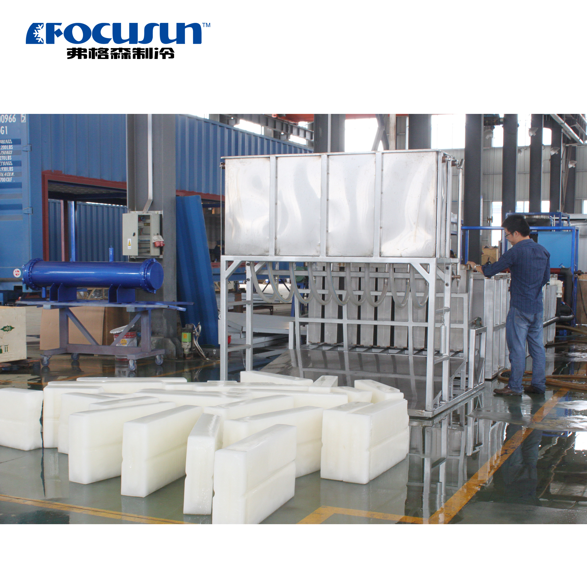 Traditional brine system block ice machine using a saltwater tank and heavy-duty ice cans for large-scale industrial and fishery cooling.