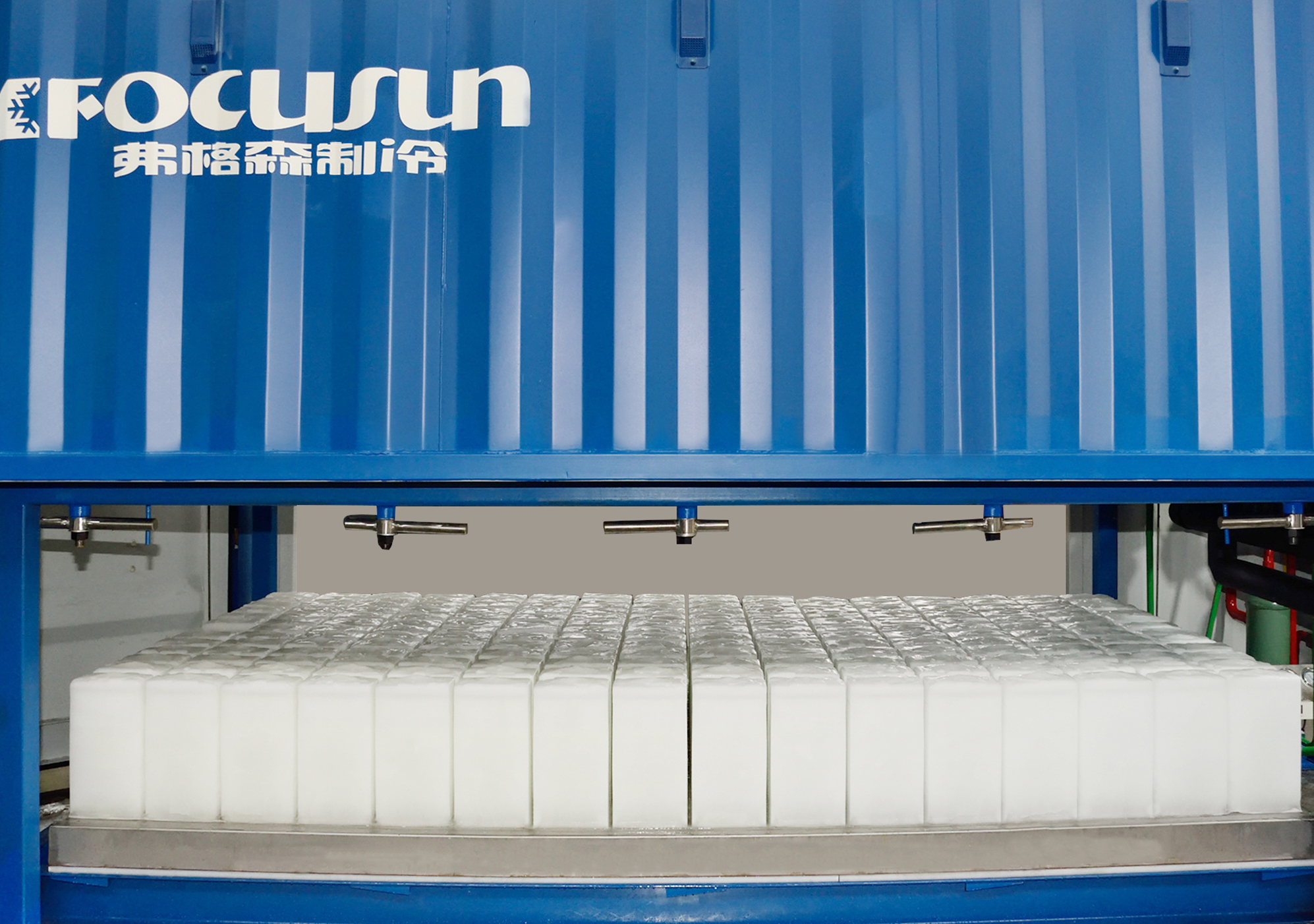 Plug-and-play containerized block ice machine built inside an ISO shipping container for rapid mobile deployment in remote coastal ports.