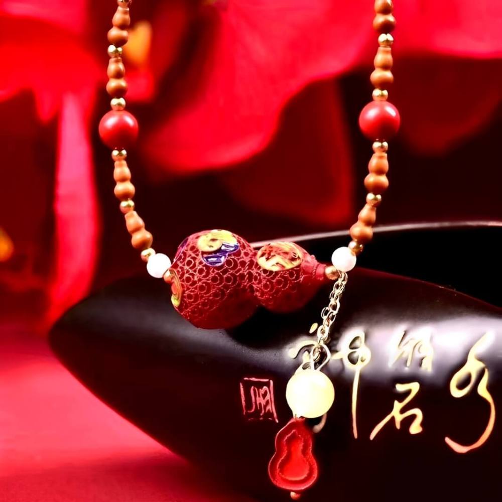 Cinnabar Painted Peaceful Gourd Olive Kernel Necklace