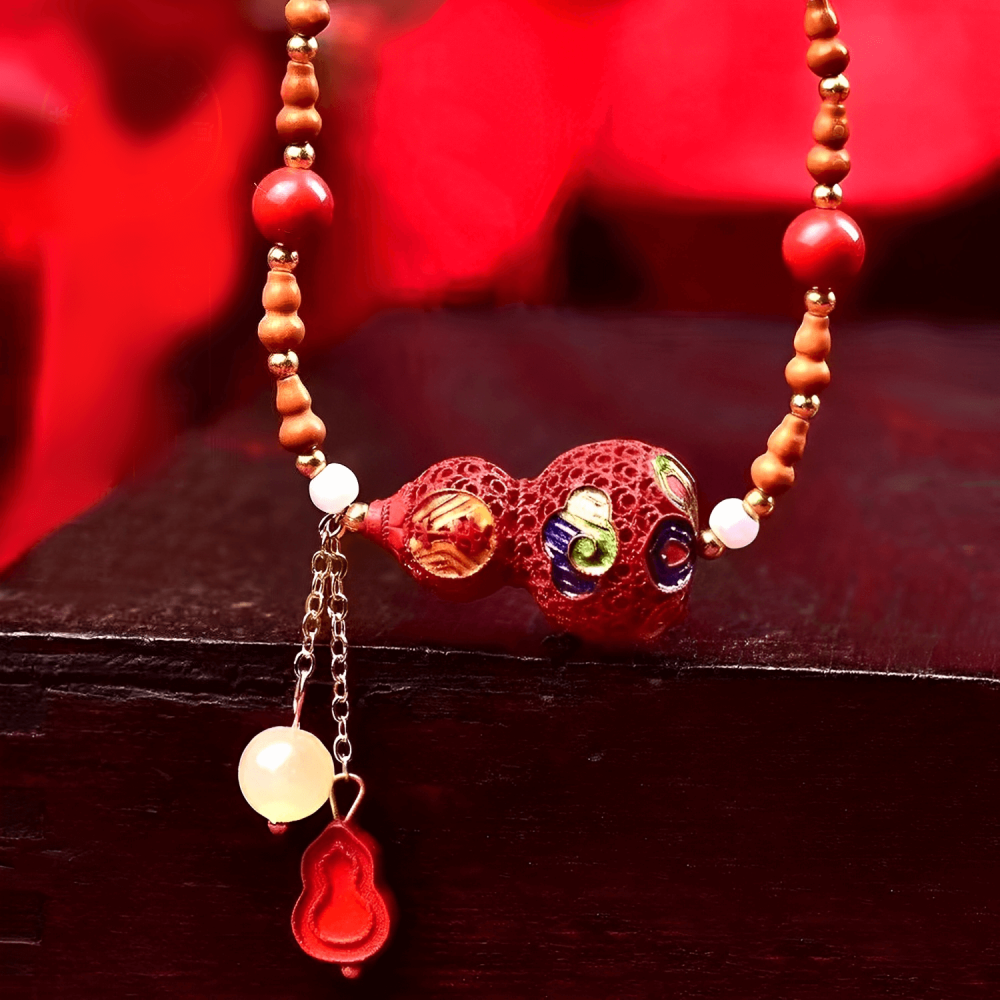 Cinnabar Painted Peaceful Gourd Olive Kernel Necklace