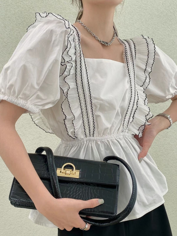 White Design inspired waist cinching bubble sleeve top
