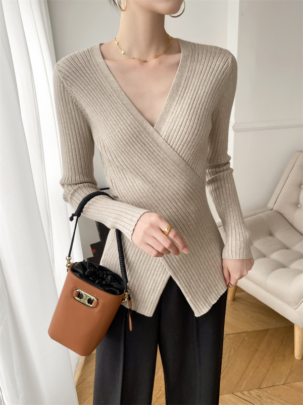 Oat colored V-neck cross sweater