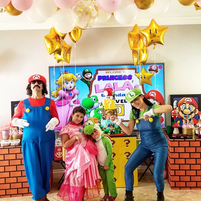 family dressed in super mario halloween clothings