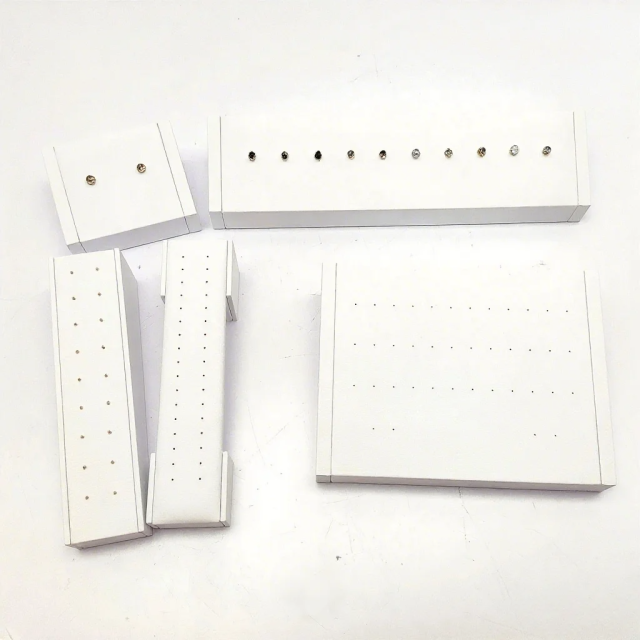 FADELI Factory Custom Piercing Jewelry Display White Pu Leather Stud Earring Display Stand with Silkscreen Gold logo Ring Display