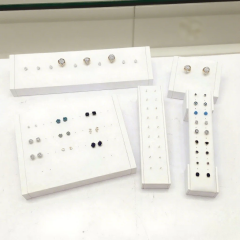 FADELI Factory Custom Piercing Jewelry Display White Pu Leather Stud Earring Display Stand with Silkscreen Gold logo Ring Display