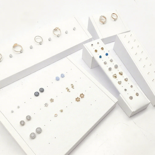FADELI Factory Custom Piercing Jewelry Display White Pu Leather Stud Earring Display Stand with Silkscreen Gold logo Ring Display