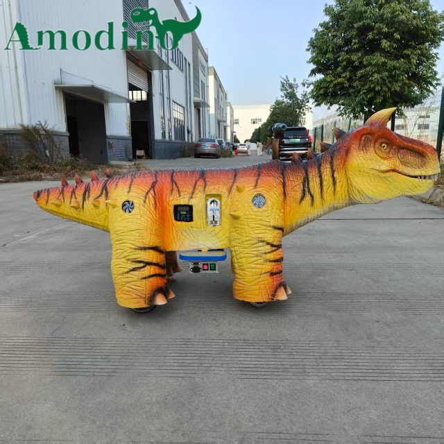 Custom Orange Striped Carnotaurus Kiddie Ride | Commercial Dinosaur Ride Manufacturer