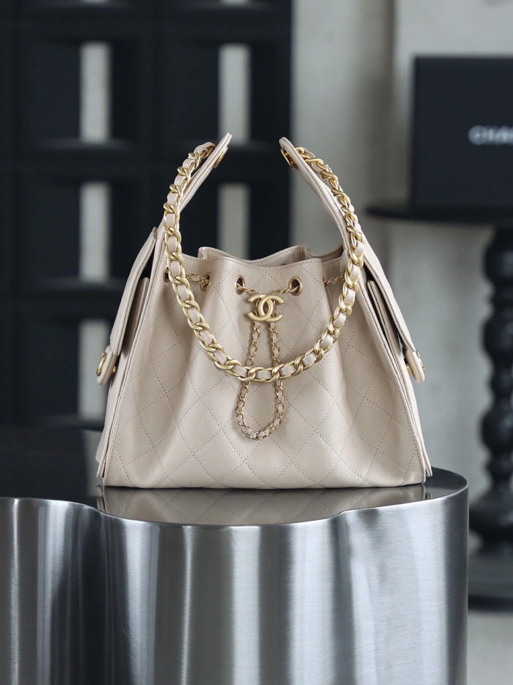 The Chanel 25 Hand Gag