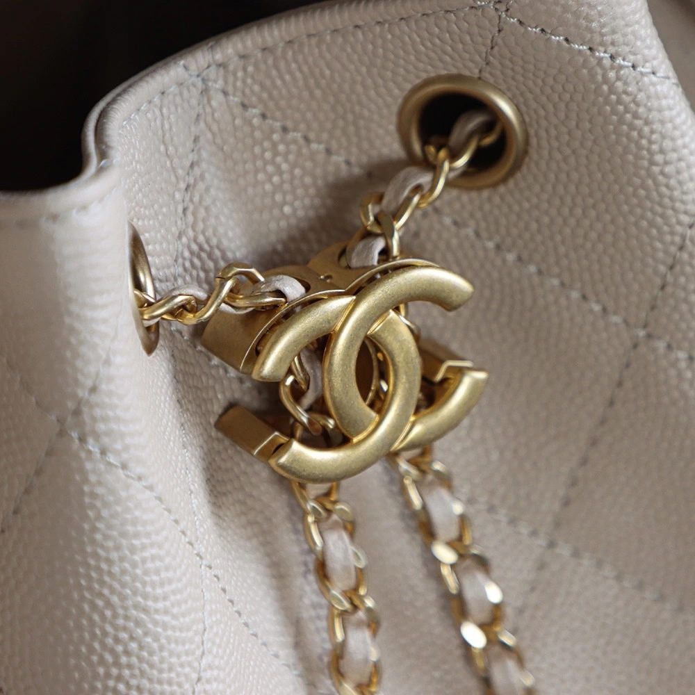 The Chanel 25 Hand Gag